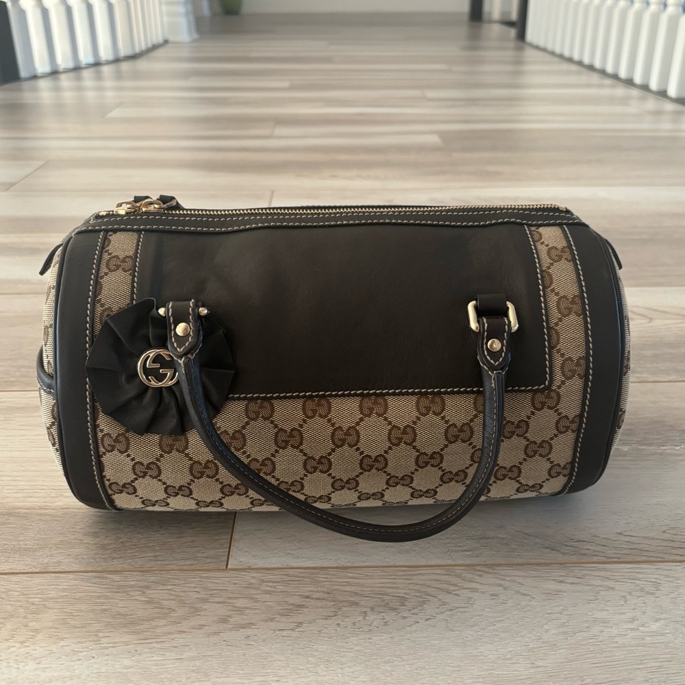 Authentic Gucci Monogram Canvas Trophy bag